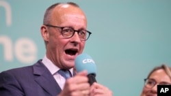 Liderul conservatorilor germani (CDU/CSU), Friedrich Merz, în timpul discursului de după aflarea rezultatelor la alegerile federale.