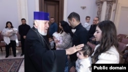 Armenia - Catholicos Garegin II blesses refugees from Nagorno-Karabakh at his Echmiadzin headquarters, January 5, 2025.