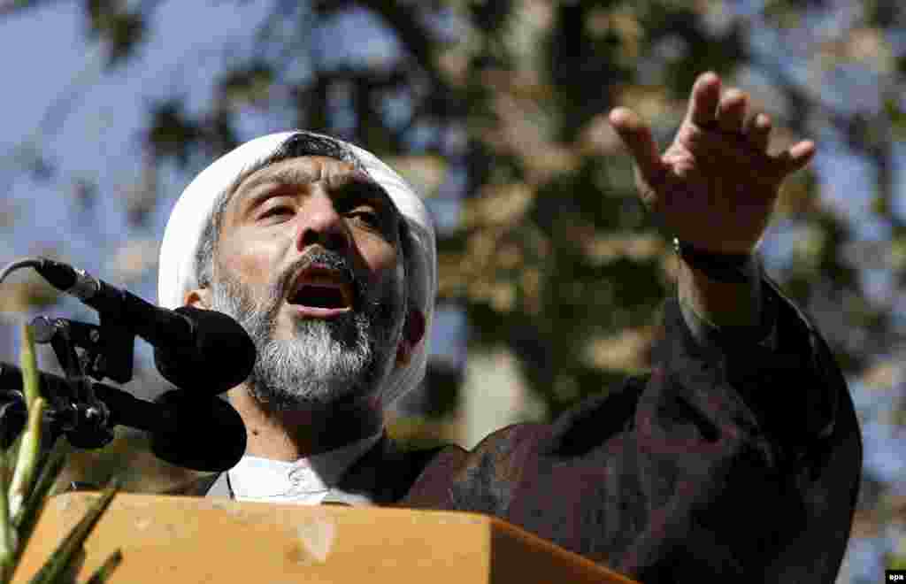 A DARK-HORSE CANDIDATE: Mostafa Pourmohammadi, born in 1959, is a former interior minister who currently heads the Organization of National Inspection. The cleric has been accused of playing a key role in the mass executions of thousands of political prisoners in the 1980s. "Hamshahrionline" has quoted him as saying that Iranians will have to wait until registration time to discover if he's running or not.