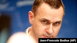 Ukrainian filmmaker Oleh Sentsov attends a press conference at the European Council in Strasbourg on October 2.