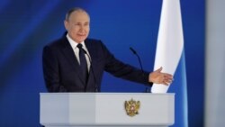 Russian President Vladimir Putin delivers his annual address to the Federal Assembly in Moscow on April 21, 2021.