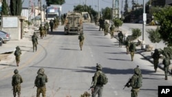 نیرو های اسرائیلی در بخشی از شهر غزه