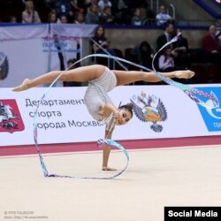 Айша Изабекова.