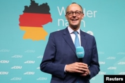 Friedrich Merz face declarații după câștigarea alegerilor, 23 februarie 2025.