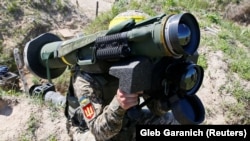  Під час військових навчань на Рівненщині в умовах, максимально наближених до реальних бойових, із використанням ракетних комплексів «Джавелін» та безпілотників Bayraktar TB2. Рівненська область, травень 2021 року