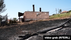 Një shtëpi e djegur nga zjarri, më 12 gusht, në fshatin Kçiq i Madh.