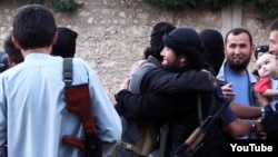 "Сирияға аттанған Қазақстандық жиһадшылар". (YouTube видеосынан алынған скриншот).  