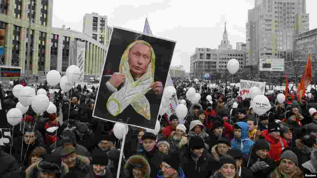 After the first round of protests, Putin had compared demonstrators' white ribbons to condoms.