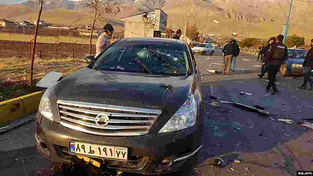Fakhrizadeh's bullet-riddled car after the lethal attack near Tehran on November 27. Initial reports suggested several gunmen had attacked the physicist's car after detonating a bomb nearby. But Iran has since claimed that remote-controlled "electronic equipment" was used in the attack, and that no assassins were present at the scene. Images released by Iranian state media show a puddle of blood on the road next to the car seen in this photo, and what appears to be the remains of a large explosion littering the road where the physicist was killed.&nbsp;