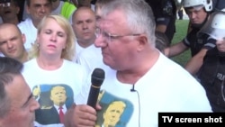 Serbian Radical Party leader Vojislav Seselj took to wearing T-shirts supporting Donald Trump.