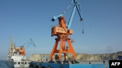 FILE: Pakistani soldiers guarding the port of Gwadar in Balochistan.