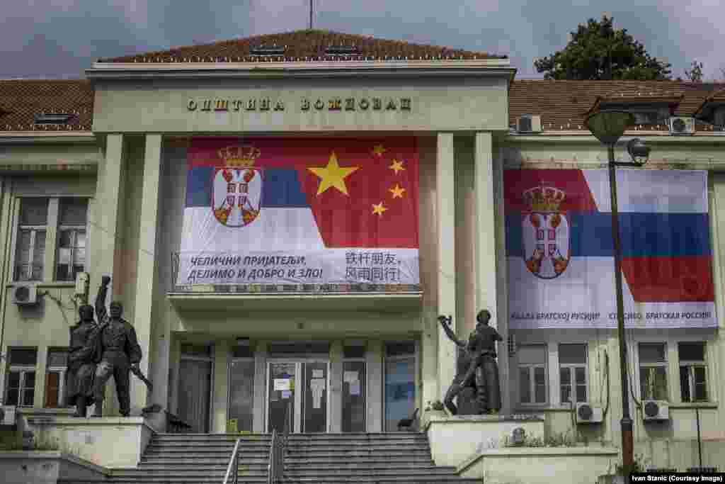 A banner linking Serbian and Chinese flags, and Serbian and Russian ones, on a municipal building in southern Belgrade on April 13. The Cyrillic script on the left says: &ldquo;Iron Friends, Together In Good And Evil!&quot; and on the right: &ldquo;Thank You Brother Russia!&rdquo; &nbsp; &nbsp; &nbsp; &nbsp;