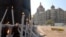 Candles outside the Taj Mahal Hotel, site of one of the bloodiest attacks