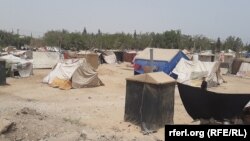 کندز کې د جګړو له امله بې‌ځایه شوې کورنۍ