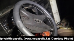 The blood-splattered steering wheel of the Niva belonging to Panayot Zakharopulo