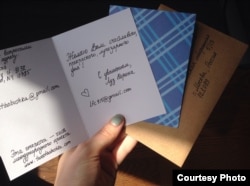 "I wish you a happy, wonderful, and shiny day," reads one of the cards that Golikova is sending out. "I'm trying to imitate the traditional handwriting," she says.