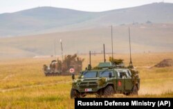 ჩინეთის სამხედრო მანქანები რუსეთში სამხედრო წვრთნების დროს. 2018 წ.