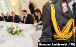Fiona Hill in Helsinki in 2017 alongside US President Donald Trump (third right), national-security adviser John Bolton (left), US Ambassador to Finland Robert Pence (second left), and US Secretary of State Mike Pompeo.