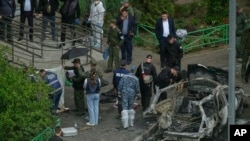 Prosecutors alleged that a man who was paid by Ukrainian intelligence was behind a car bombing that killed a Russian general in a Moscow suburb on April 24.