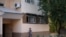 A local resident walks outside the apartment block in Tashkent where Sayfullo Saipov, the suspect in the New York terror attack, reportedly lived between 1996 and 2006, according to police records.