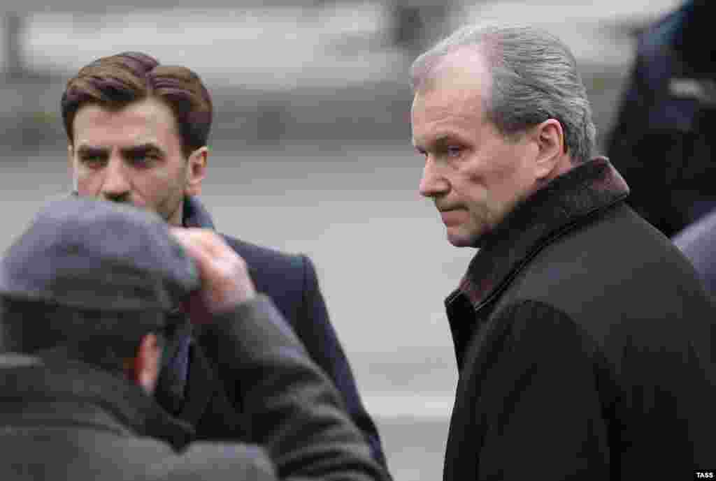 Garry Minkh (right), Putin's envoy to the State Duma, represented the Russian president at the ceremony. ​Russia's minister for open government, Mikhail Abyzov (left), also attended.