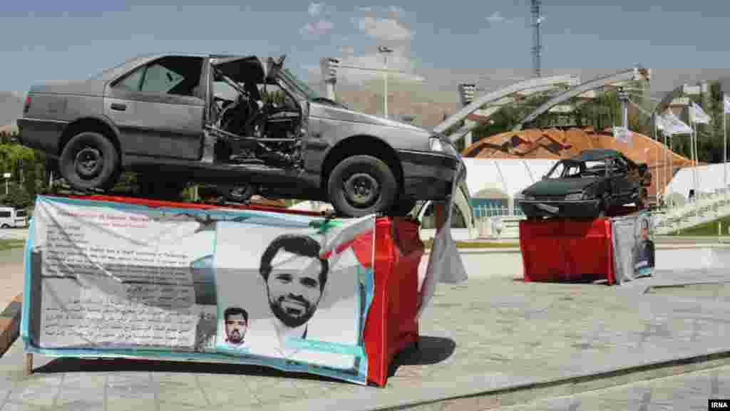 The Peugot 405 that Roshan was driving when he was killed in January 2012, on display in Tehran. According to witnesses, one of two riders on a motorcycle stuck a magnetic bomb to the door of Roshan&rsquo;s car and then disappeared into traffic before the explosive detonated. The blast also killed Roshan&rsquo;s driver. &nbsp;