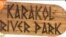 Каракол: суу жээгиндеги сейил бак
