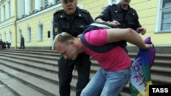 A gay activist is detained by police during a gay-pride parade in St. Petersburg in June 2011. Gavrikov says the law "gives a signal to people who are eager to express their hate and their aggression."