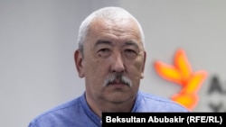 Исхак Масалиев.