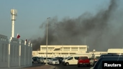 Smoke rises after Israeli strikes in Doha, Qatar, September 9