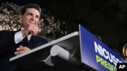 Romanian Presidential candidate Nicusor Dan addresses supporters.