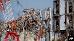 Пошкодження енергоблоків атомної електростанції Фукусіма Даічі, яких завдало цунамі. Префектура Фукусіма, північно-східна Японія. 28 лютого 2012 року