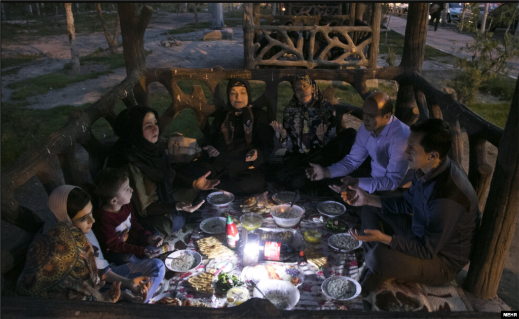 A family in the Iranian capital, Tehran, break their daily Ramadan fast. Throughout the holy month Muslims are&nbsp;not permitted to eat or drink during the day. The Ramadan fast is intended to bring the faithful closer to God and to remind them of the suffering of those less fortunate.