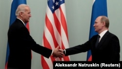 Then U.S. Vice President Joe Biden meets with Vladimir Putin in Moscow in March 2011.