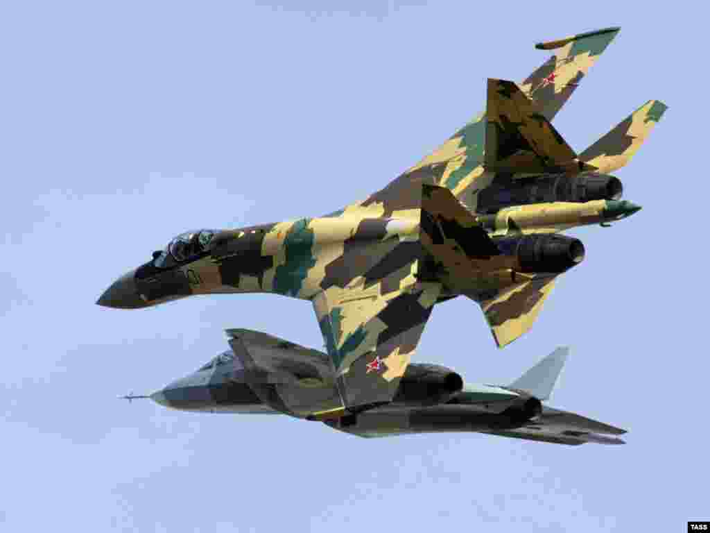 The plane's manufacturer, Sukhoi, is trying to enter the commercial aircraft market after years making military jets like the Su-35 and T-50 in this shot from a 2011 test flight.