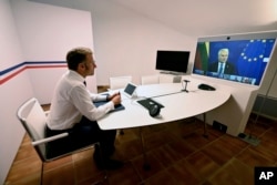 Emmanuel Macron a coprezidat reuniunea virtuală
