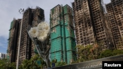 Гонконгдогу өрт каптаган турак жай комплекси.