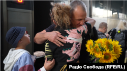 Yesypenko greets family and friends at the Kyiv train station on August 1.