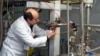 An IAEA inspector checks the enrichment process inside the uranium Natanz enrichment plant in Iran in 2014.