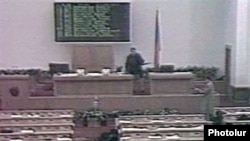 Armenia - A screenshot of TV footage of gunmen opening fire in the Armenian parliament on 27 October, 1999.