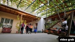 The film depicts affluent migrants sending money back home.