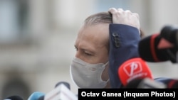 Premierul Florin Cîțu nu este de acord să semneze un protocol prin care să nu mai poată remania miniștri fără acordul Coaliției. 