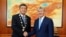 Kyrgyz President Sooronbai Jeenbekov (left) at his inauguration with his predecessor, Almazbek Atambaev. Relations between the two men seem to have soured in recent weeks.