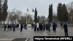 Mourners gather at Lviv's Lychakiv Cemetery.