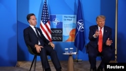 Președintele american Donald Trump, alături de secretarul general al NATO, Mark Rutte, la o conferință de presă, la summitul liderilor NATO din Haga. 25 iunie 2025.