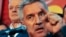 Montenegrin Prime Minister Milo Djukanovic and leader of ruling Democratic Party of Socialists speaks to his supporters after parliamentary elections in Podgorica on October 17.