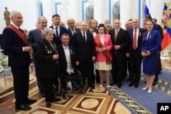 ვალერი გერგიევი (მარცხნიდან მეორე) სახელმწიფო დაჯილდოების ცერემონიაზე კრემლში. 2024 წლის მაისი