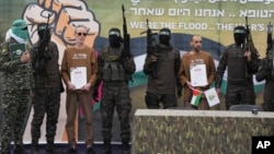 Кадры вызваленьня закладнікаў 8 лютага.