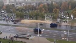 Belarusian Protesters Brave Water Cannons