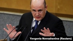 Mikhail Mishustin, who was nominated by Russian President Vladimir Putin as the candidate for the post of prime minister, speaks during a session of the State Duma, the lower house of parliament, in Moscow on January 16.